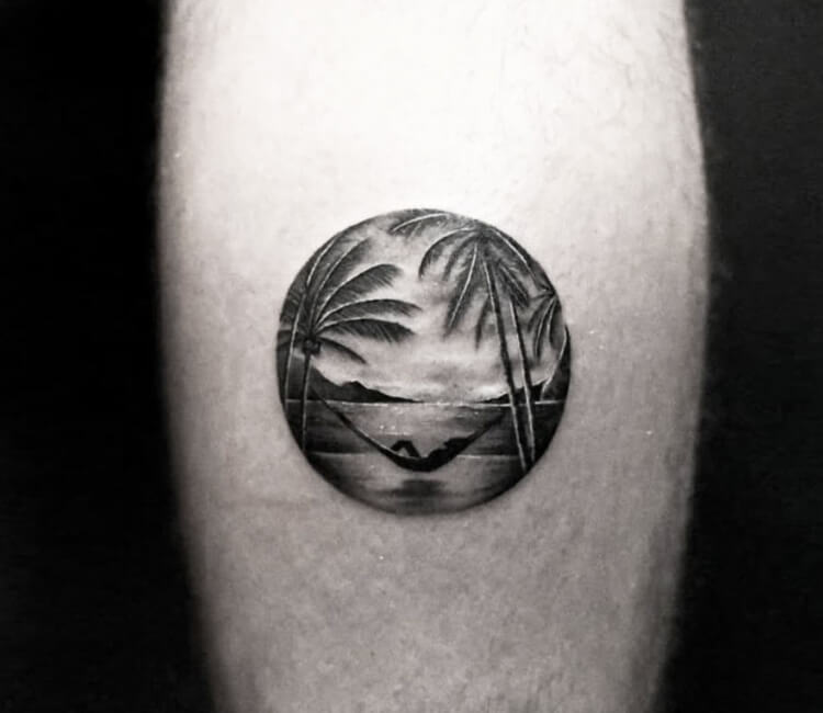 This is an extremely simple and minimalistic tattoo on male forearm. It is  black and white