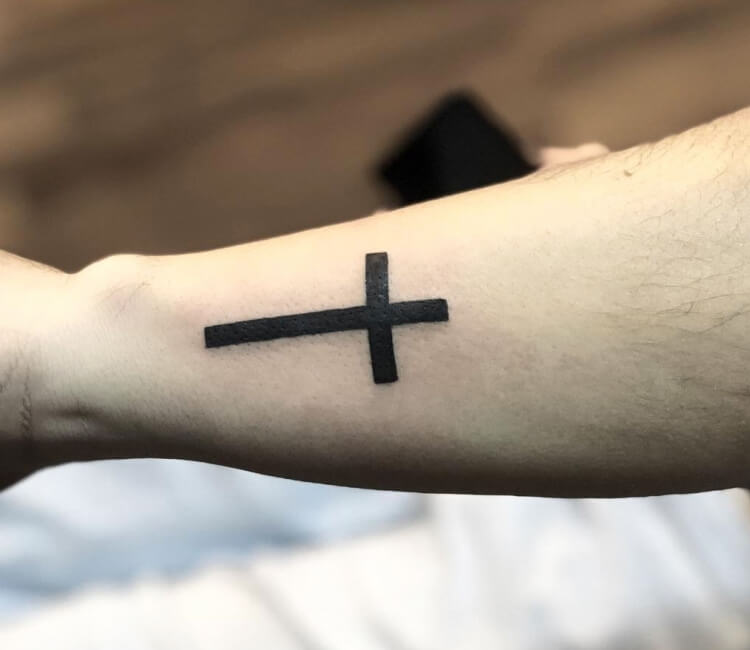 Cross tattoo by Jackson Tattoo