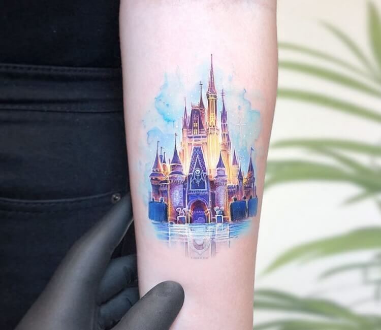 Disney castle tattoo on the right inner forearm