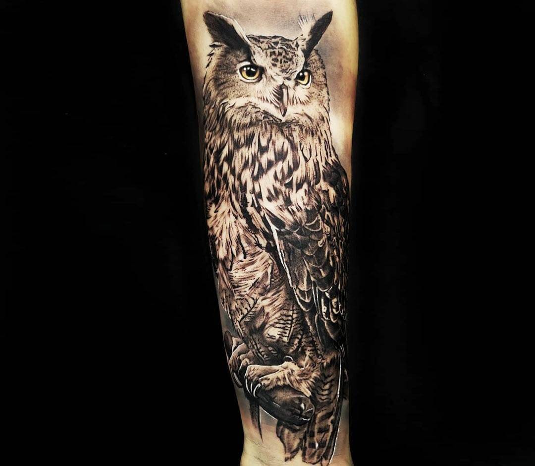 owl tattoos on forearm