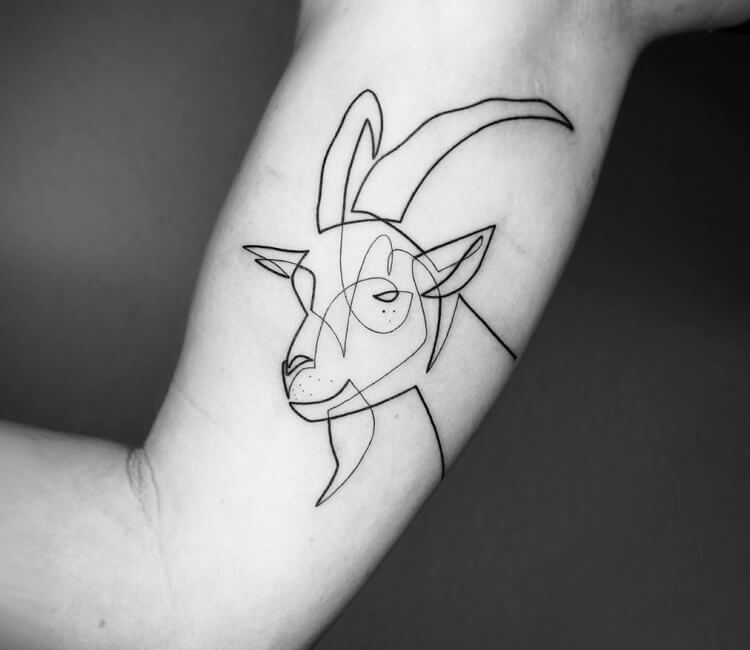 Icon of tattoo style happy goat. Icon of a tattoo style happy goat. |  CanStock