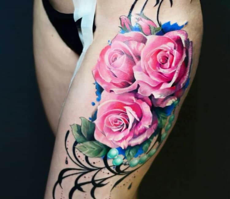 Realistic pink rose tattoo on the back