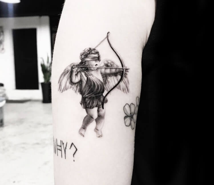 Cupid tattoo by Loïc Lebeuf  Tattoogridnet