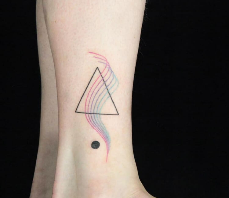 Minimalist triangle tattoo in fine line