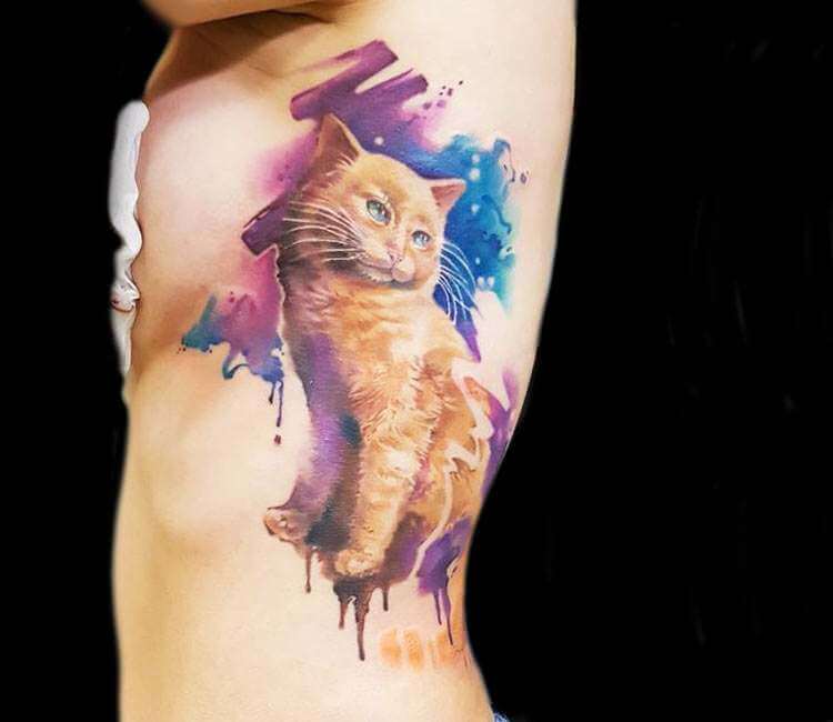 Microrealistic cat tattoo on the inner forearm