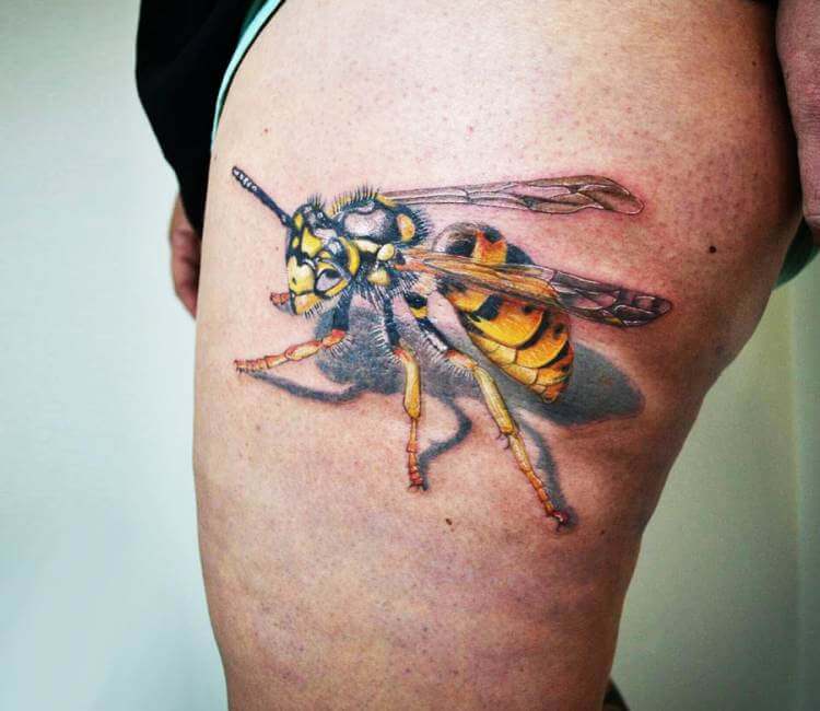 Micro-realistic bee tattoo done on the bicep.