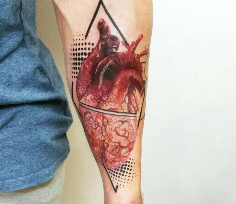 Anatomical heart and brain tattoo on Bea Miller