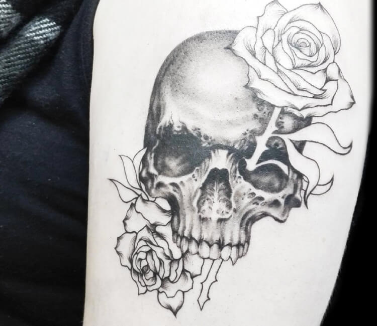 Vampire skull and flowers hand drawn illustration Tattoo vintage print  Skull and roses Stock Vector  Adobe Stock