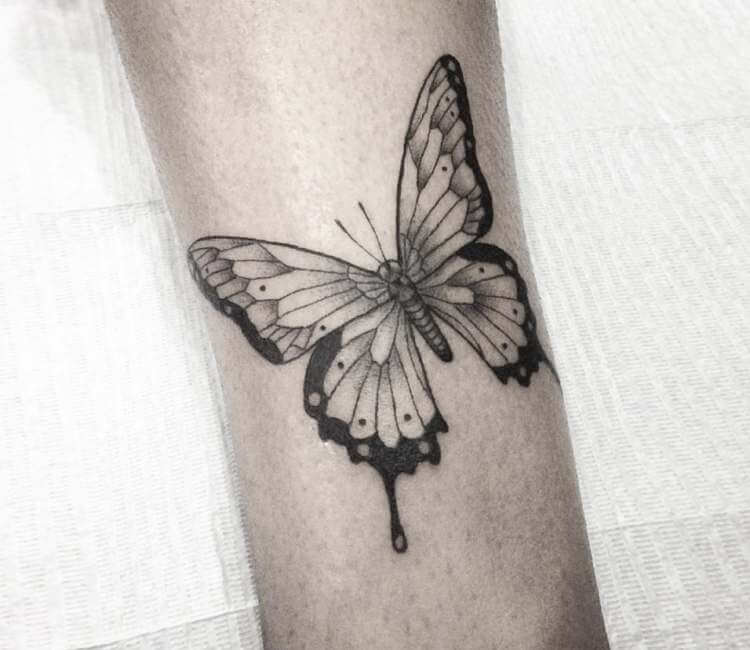 Grey And Black Butterfly Tattoo On Lower Back