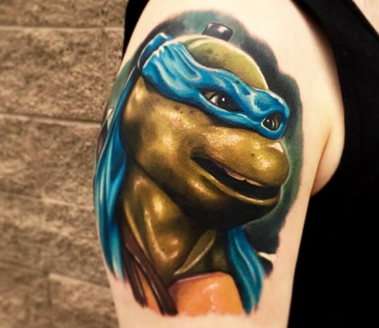 Right forearm tattoo of Leonardo, the ninja turtle, on