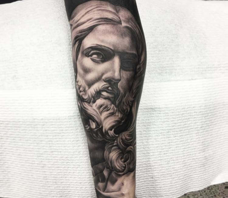 Jesus Face Statue Tattoo