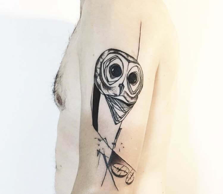 barn owl tattoo wrist