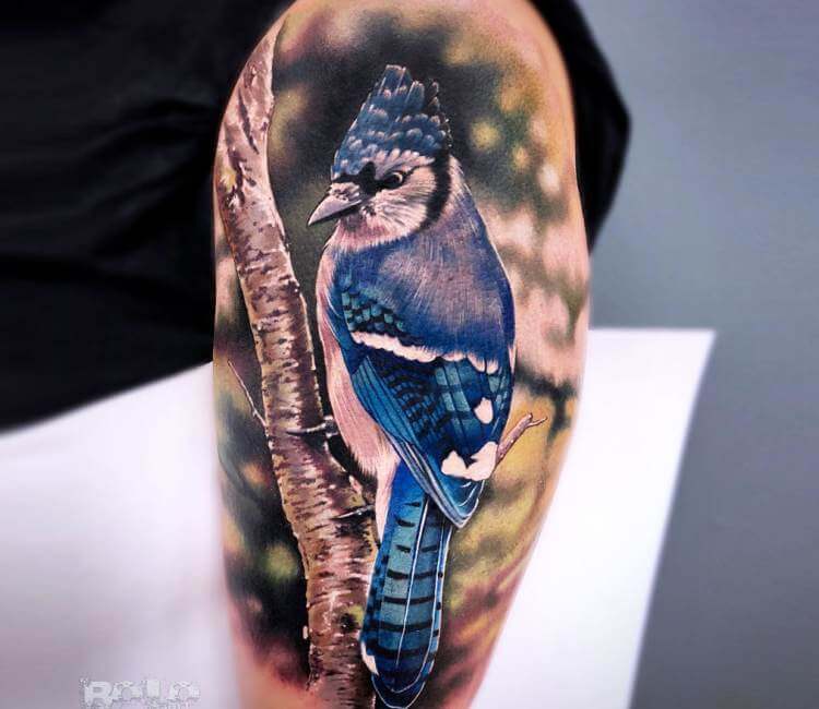 Woodpecker tattoo by Bolo Art Tattoo