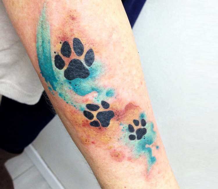 Dog Paw Prints tattoo by Claudia Denti