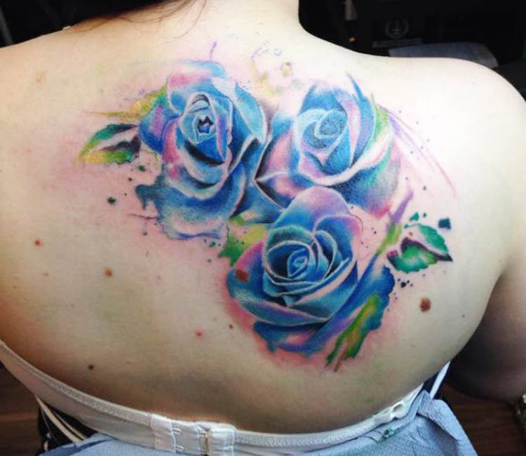 blue rose tattoo on shoulder