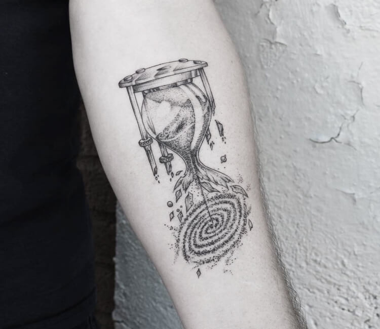 Lexica  Show me a space and time tattoo on forearm in black and white