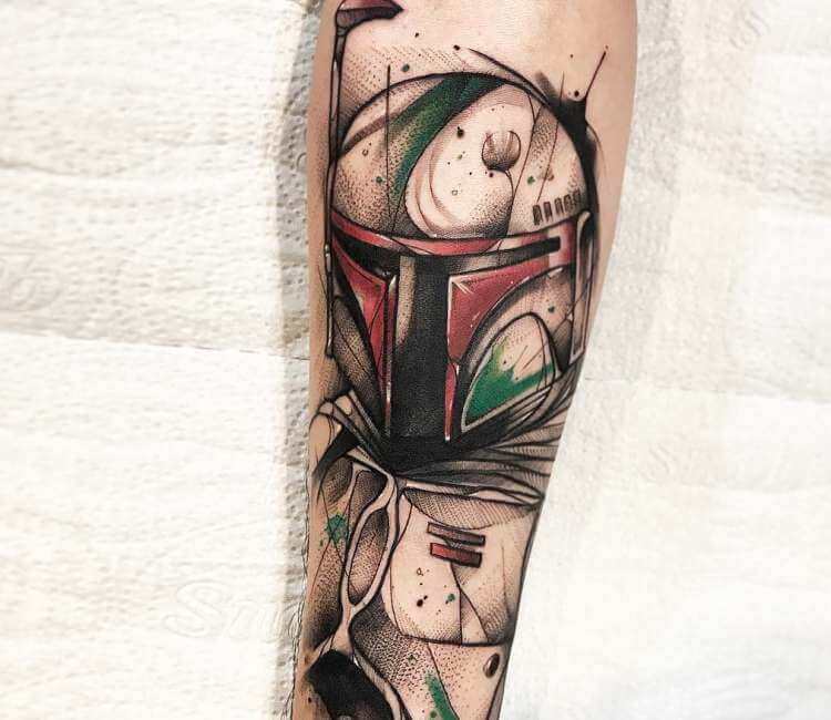 Realistic Boba Fett tattoo on the left forearm
