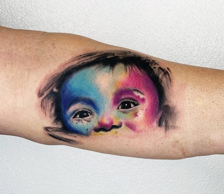 Cute Baby Head Tattoo On Left Back Shoulder