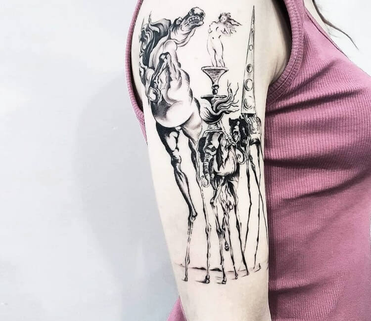 Salvador Dalí inspired elephant tattoo on the upper