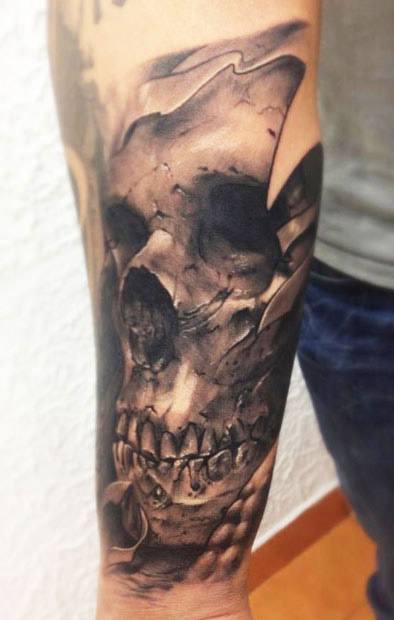 evil forearm skull tattoo by Tommy Lee Wendtner TattooNOW