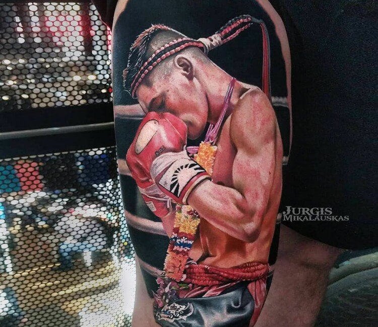 Bangkok Thailand  February 22 2016 Muay Thai fighter showing his tattoo  stock photo  OFFSET