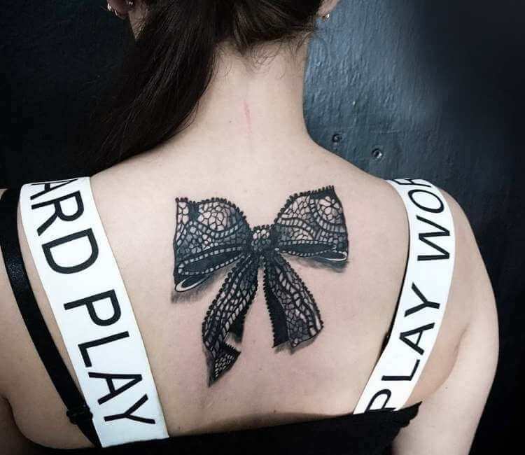 Black Lace Bow Tattoo On Girls Upper back