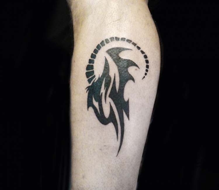tribal capricorn tattoo