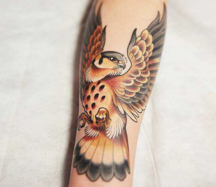 Hawk tattoo located on the thigh, engraving style.