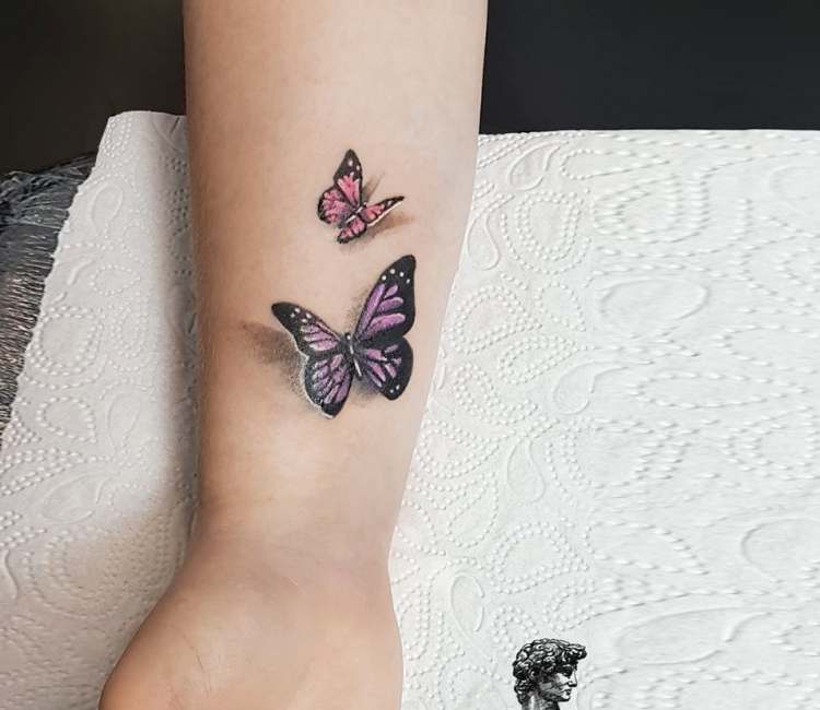 butterfly tattoo on ankle
