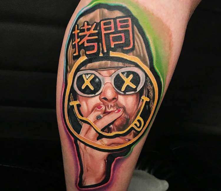 Microrealistic Kurt Cobain portrait tattoo on the