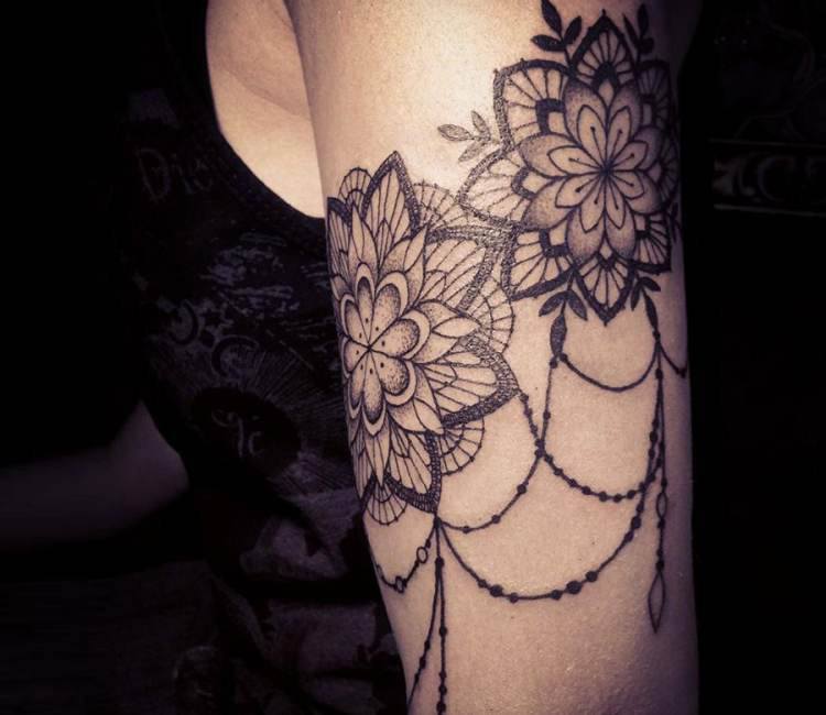 Floral mandala tattoo on the thigh - Tattoogrid.net