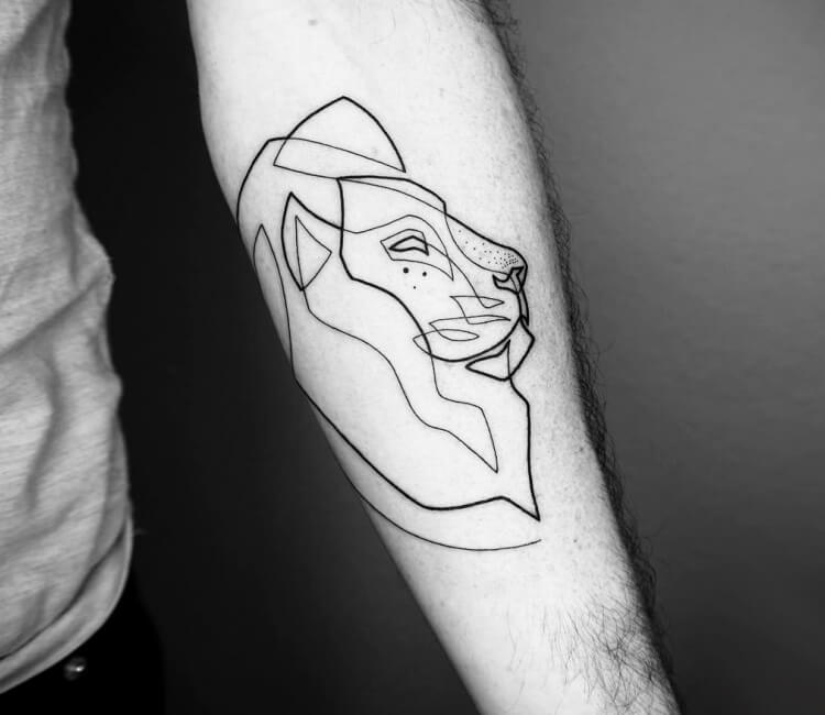 Minimalist lion tattoo