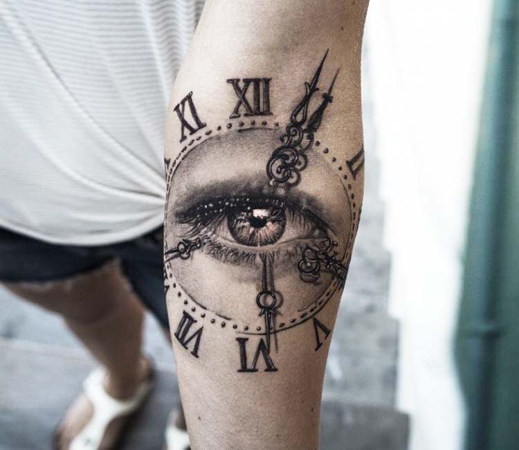 Clock with Eye tattoo by Niki Norberg