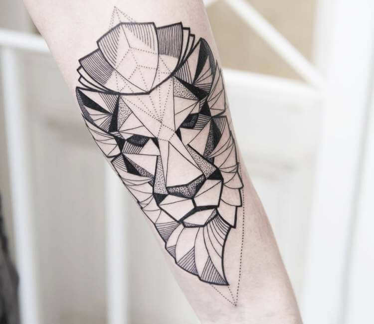 geometric lion head tattoo