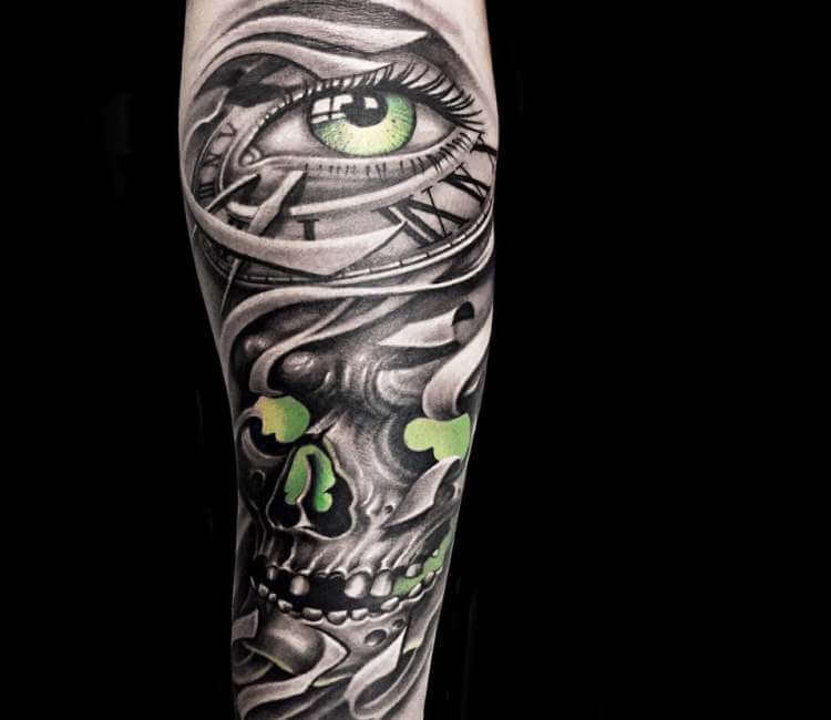 Amazing Skull rose and eye tattoo on forearm by Zak Schulte