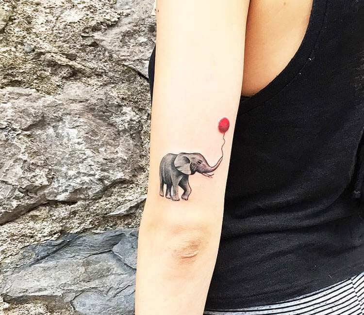 Tattoo uploaded by Randy Adams Tattoo Studio  Baby elephant and balloon  By Andy Martinez  Tattoodo