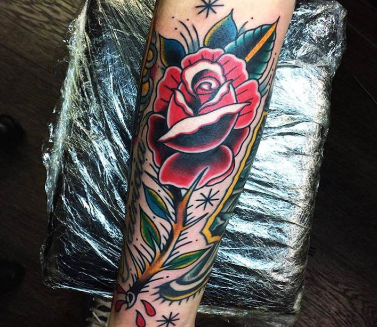 What are some tattoo recommendations with roses? I have a three rose design  on my under forearm and I'm looking to complete the sleeve. - Quora