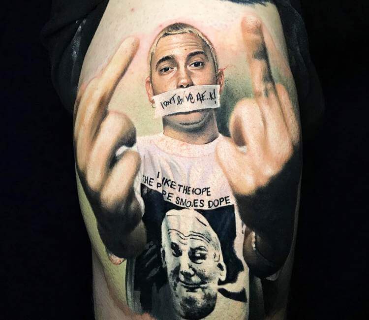 Black and grey Eminem sleeve tattoo.