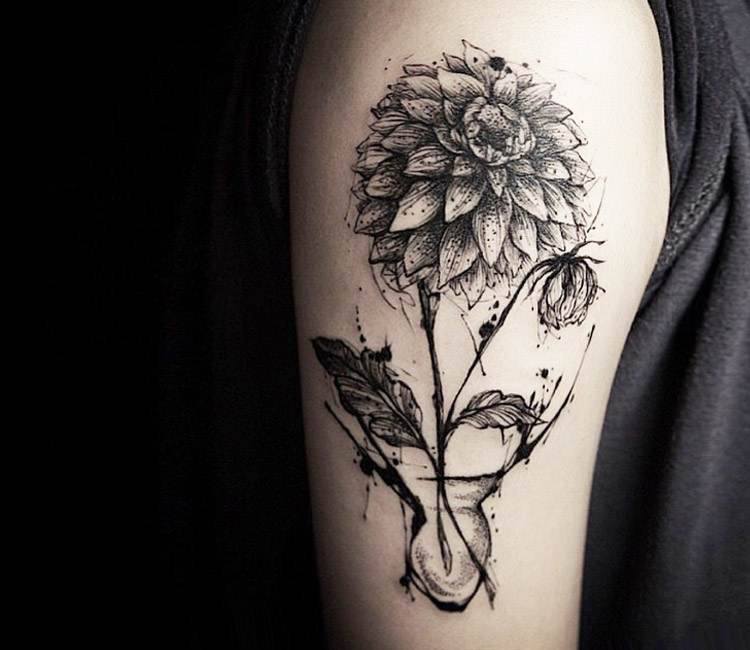 Fine line dahlia flower tattoo located on the inner