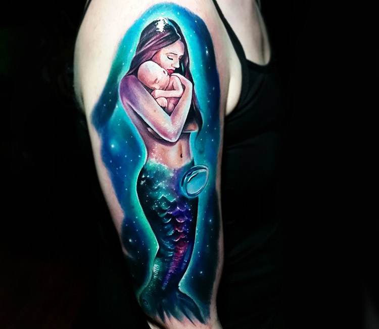 Little mermaid realistic tattoo Tyler Malek. 