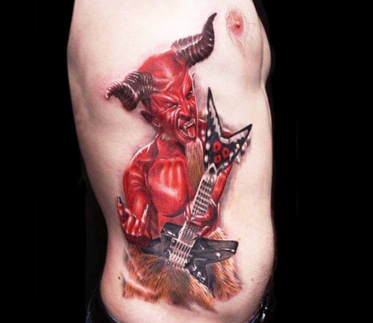 Devil guitarist tattoo by Zhivko Baychev. 
