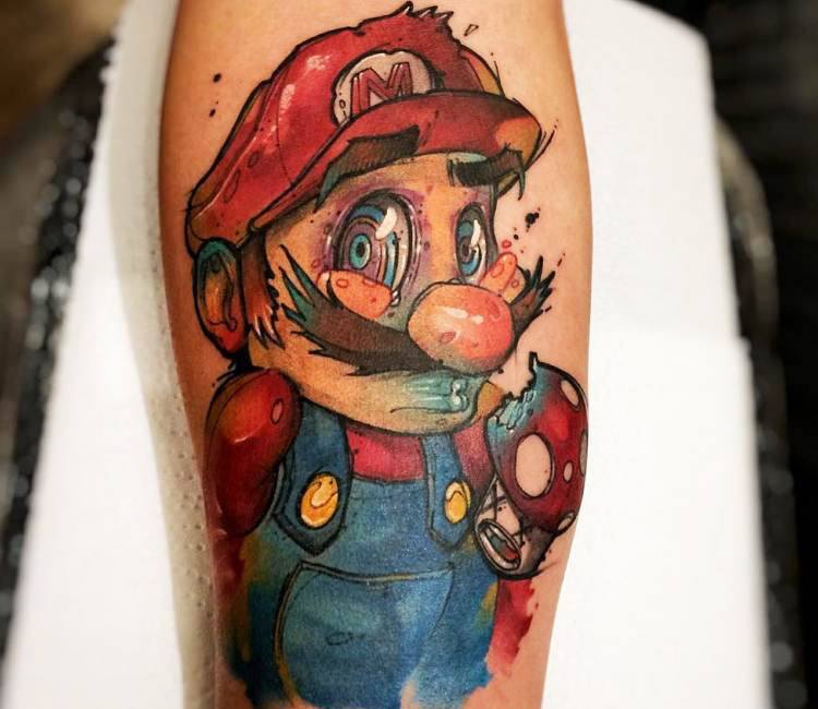 Super Mario tattoo located on the thigh