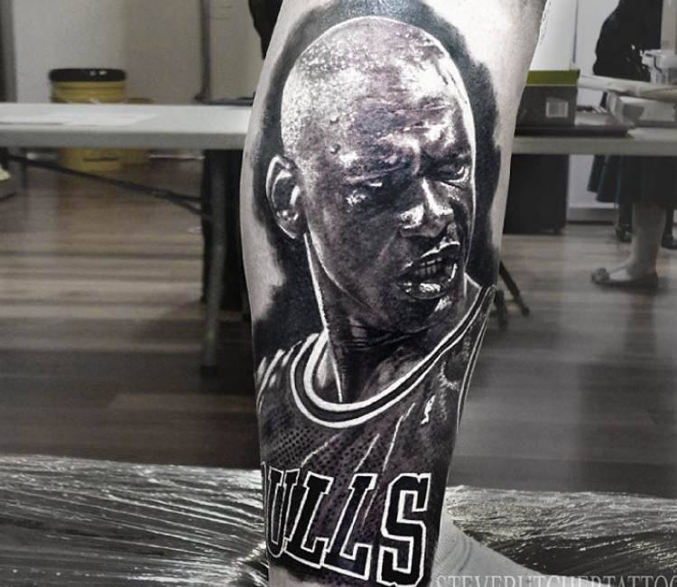 Realistic style Michael Jordan tattoo located on the